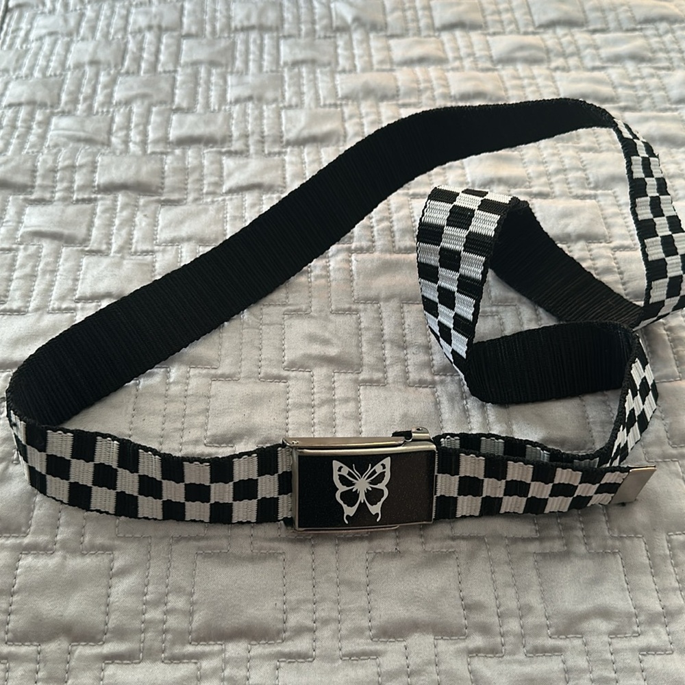 Checkered Black and White Belt with Butterfly on Buckle
NWOT